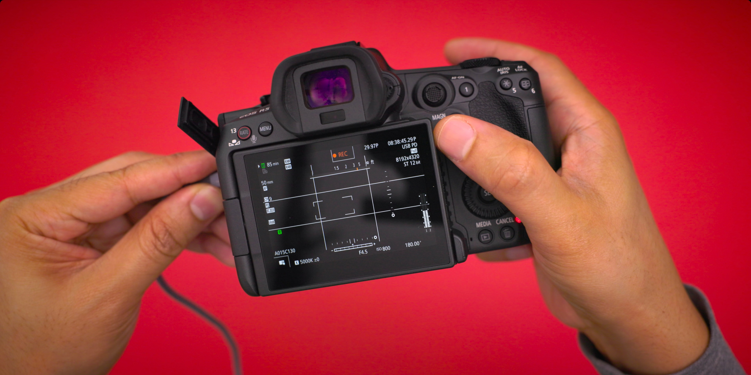 Plugging in a USB Cable to the Canon R5 C in order to take advantage of USB PD.