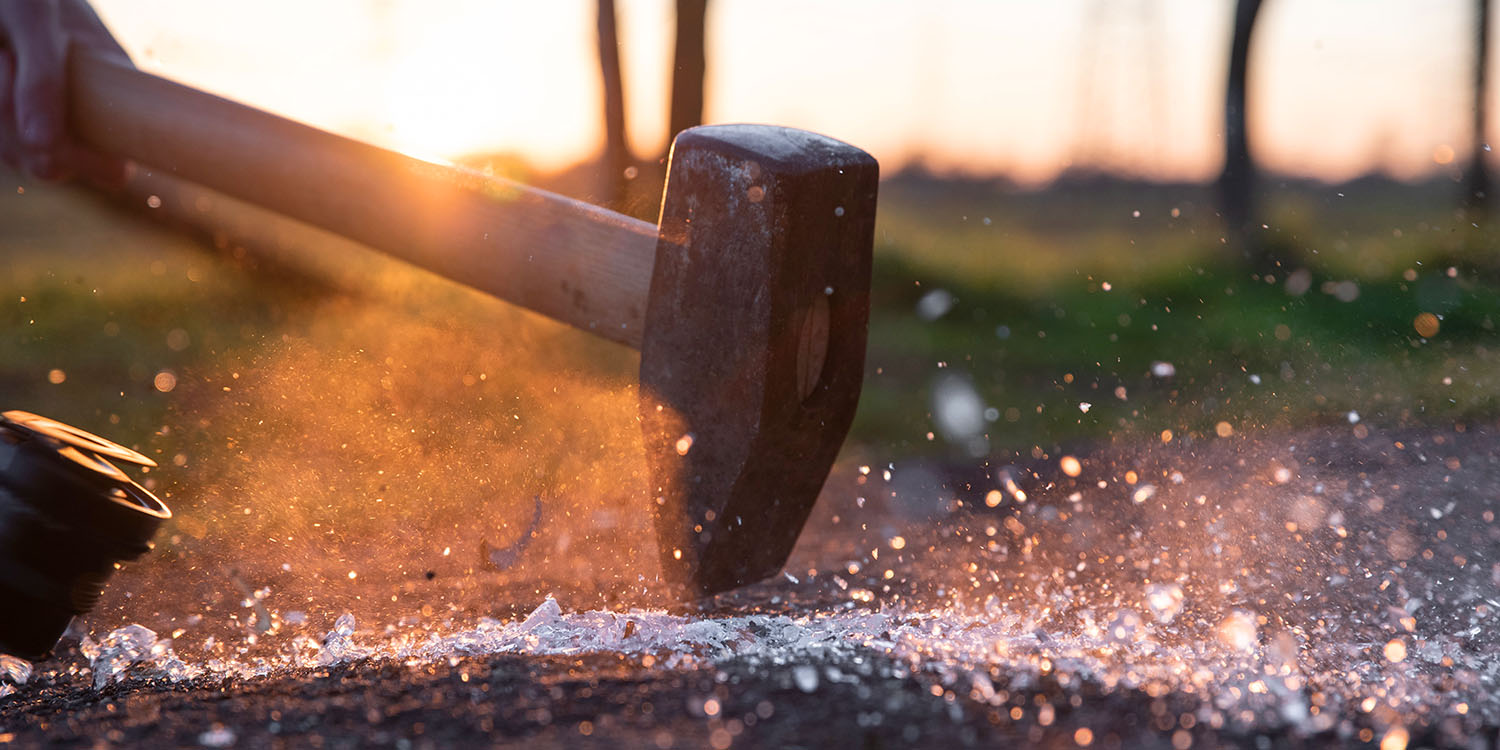 Union-busting works | Hammer shattering glass