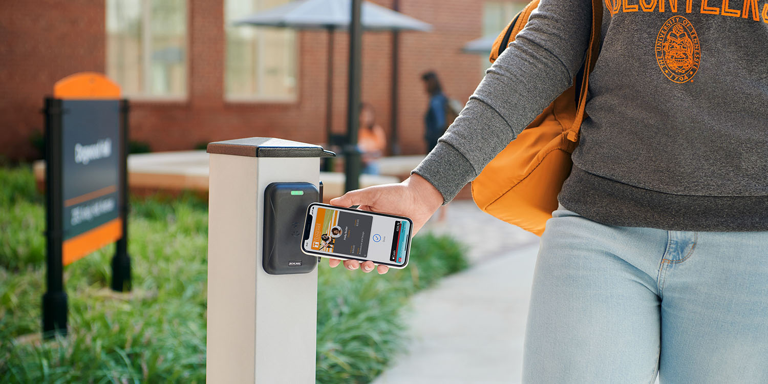 Proving our identity | A student accessing a campus facility using the Apple Wallet app