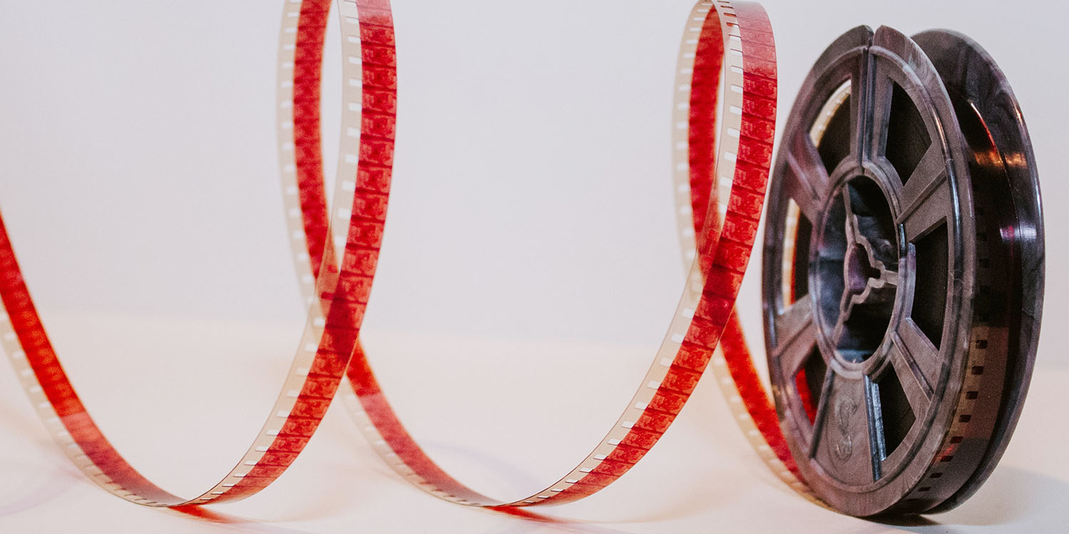 TikTok versus Reels | An old 8mm film reel partially unrolled