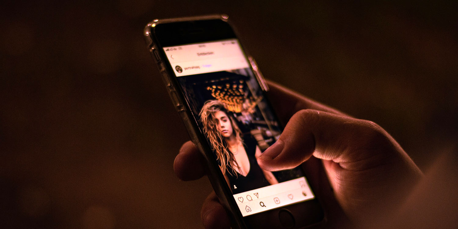 Kids' Code | Close up of iPhone with teen photo