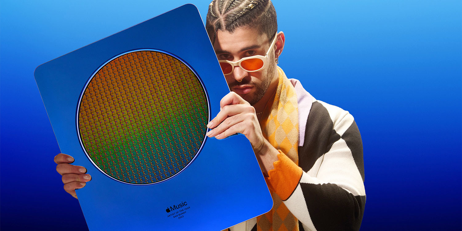 Bad Bunny, holding Apple Music artist of the year 2022 plaque