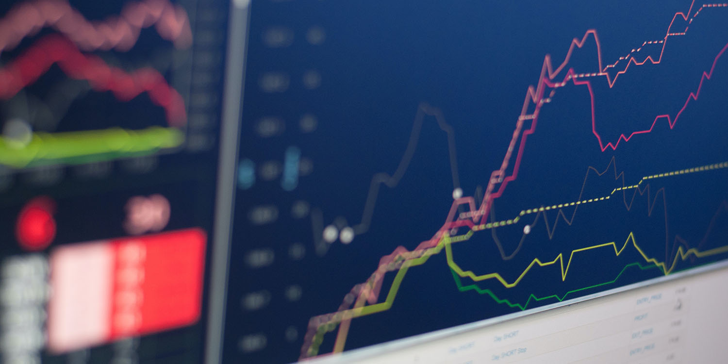 Berkshire Hathaway bought | Financial graphs on monitor