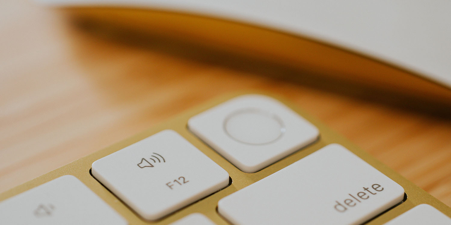 Apple account recovery | Keyboard with Touch ID shown