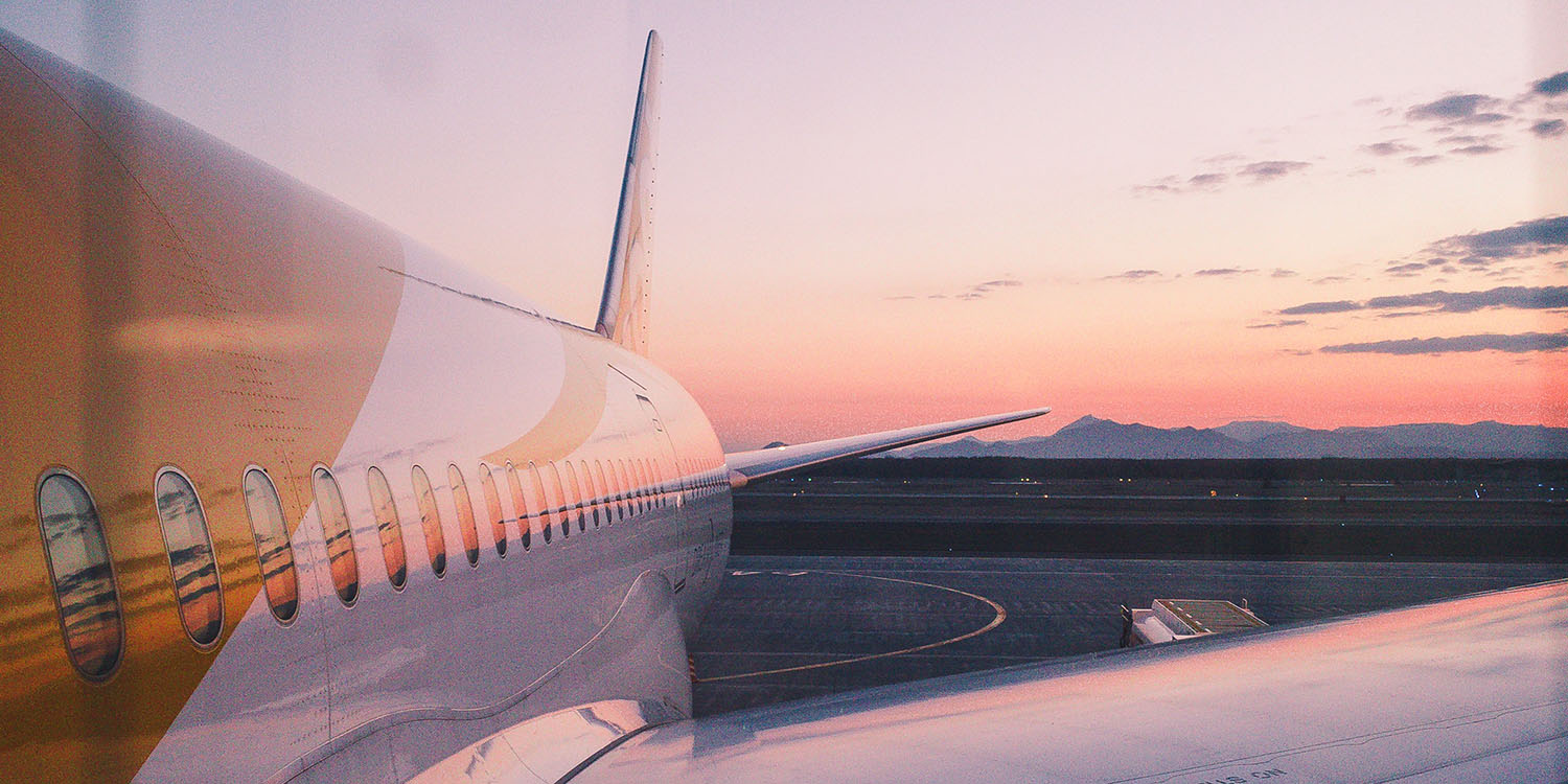 Free iPhones | Airliner at airport gate
