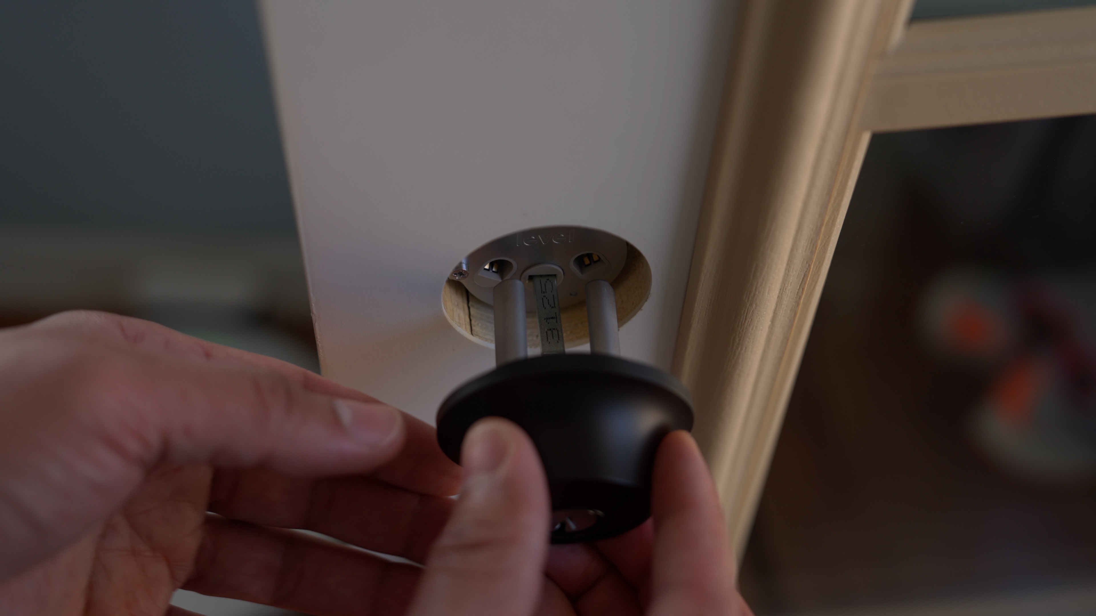 Inserting Level Lock+ key housing in the motor.