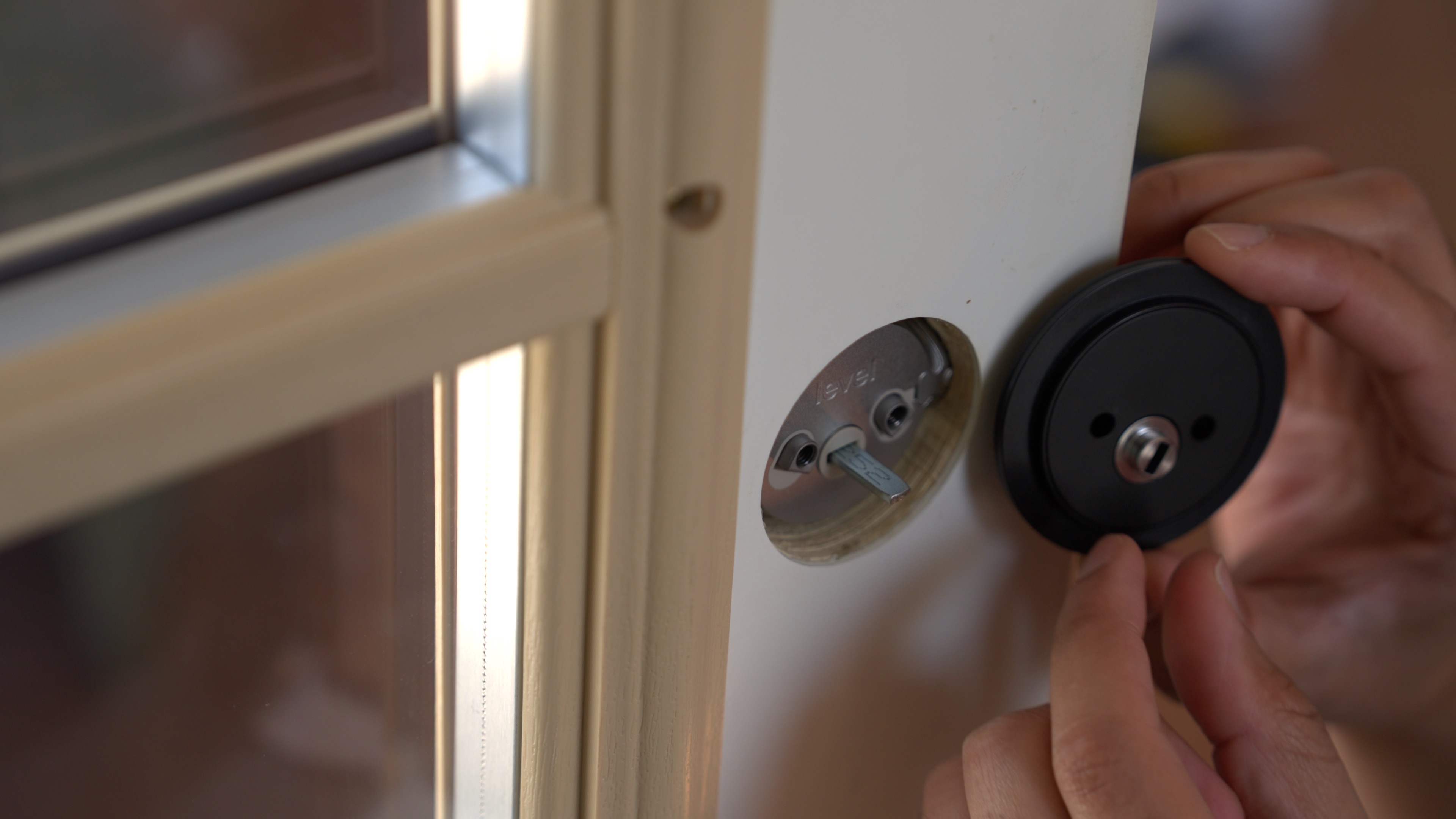 Lining up paddle housing for Level Lock Plus.