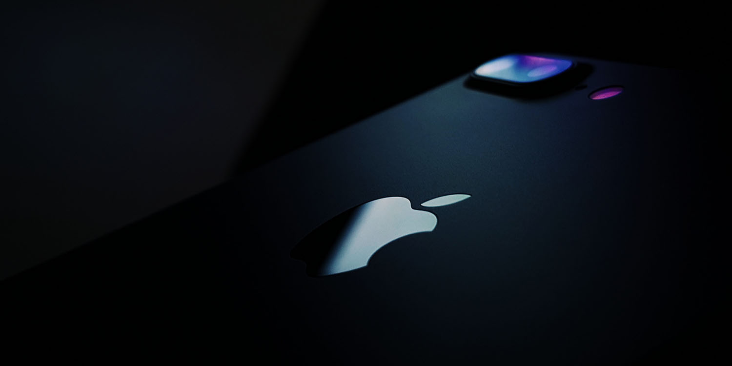 Turn off your iPhone | Low-key photo of older iPhone