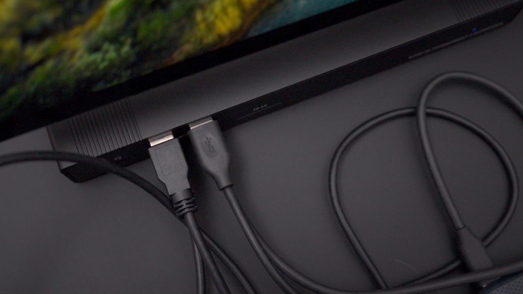 Sonnet Super Dock on desk with USB connected to front ports