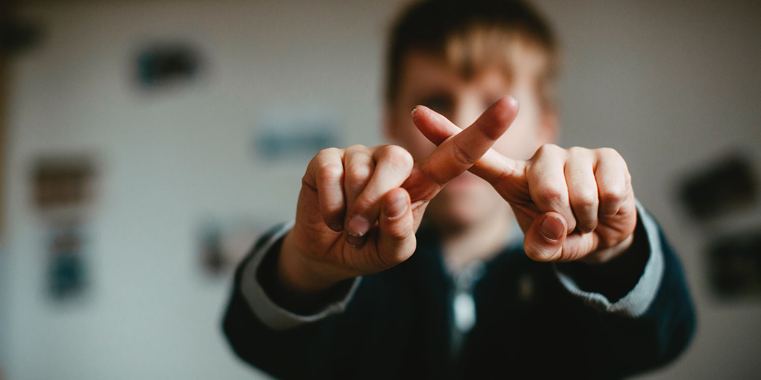 Israel-Hamas hoaxes on X | Child's fingers form X shape