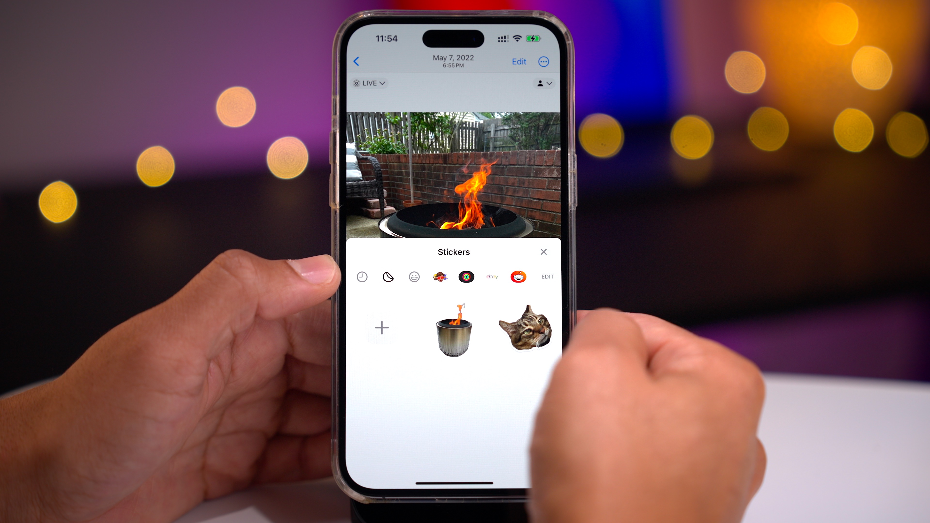Showing the new Sticker Drawer in iOS 17 with Live Stickers inside.