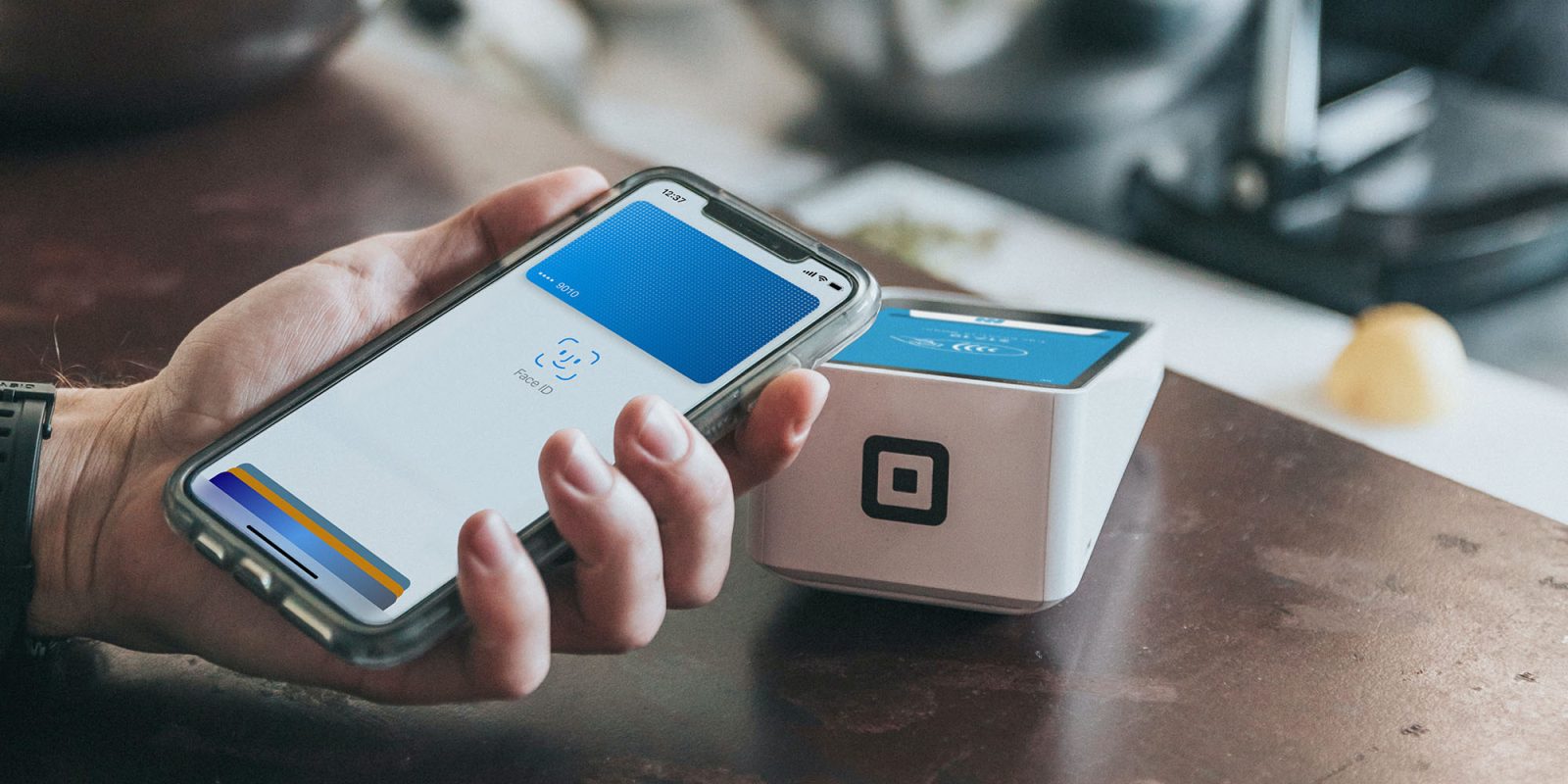 Apple Pay competitor apps coming | iPhone user making mobile wallet payment