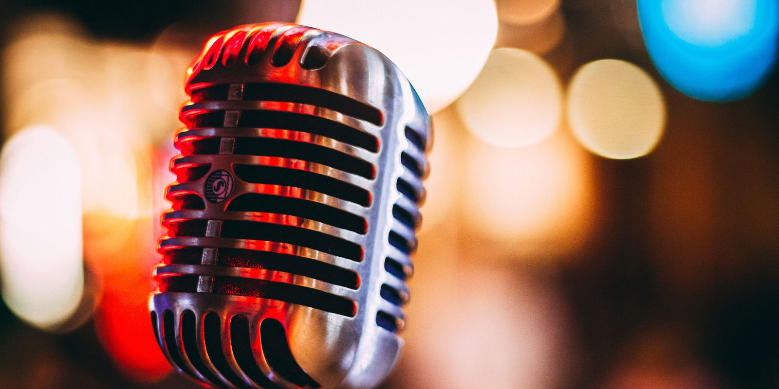 Popular podcasting app Castro gone | Microphone shown against colored lighting