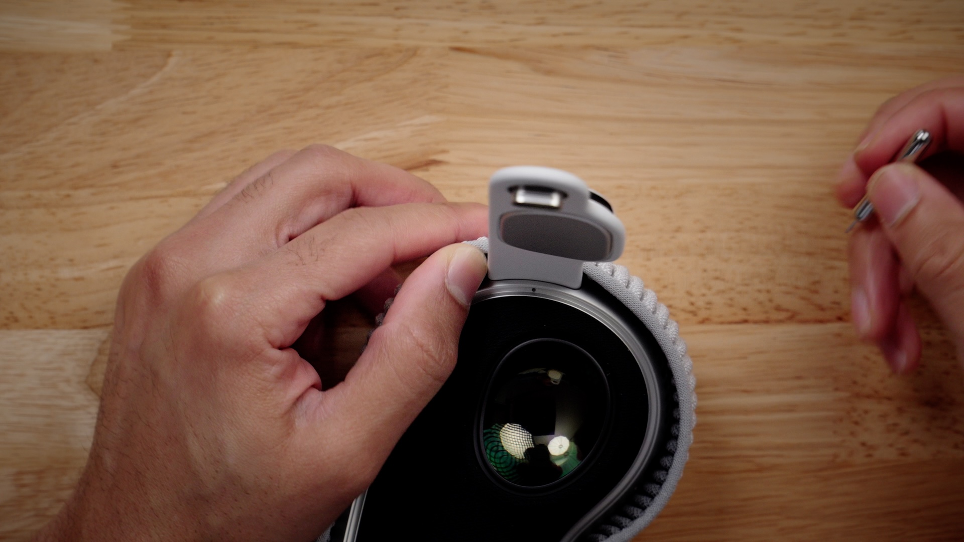 Apple Vision Pro right removing audio strap