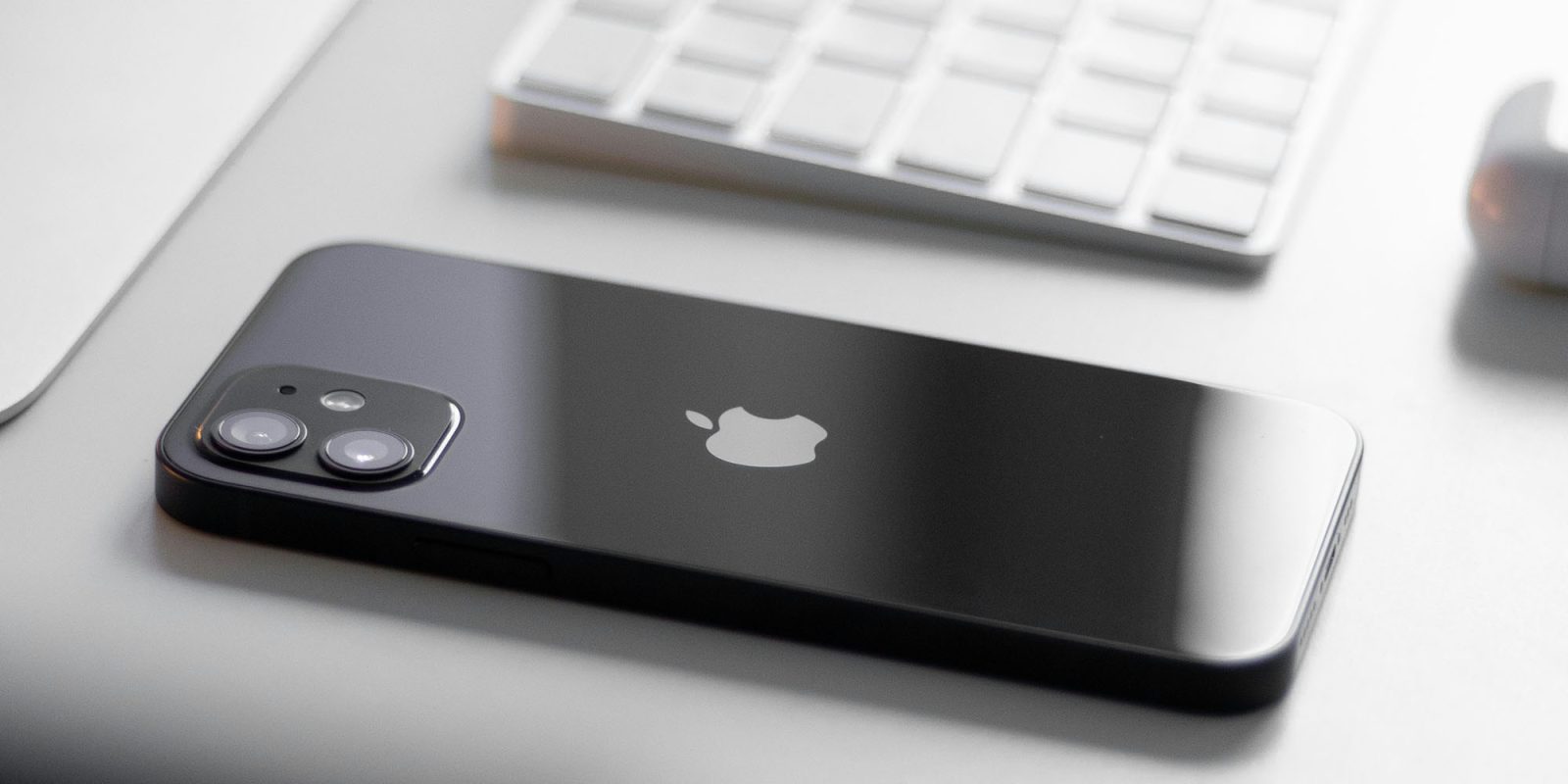 iPhone 12 Qi2 charging | iPhone 12 shown on desk