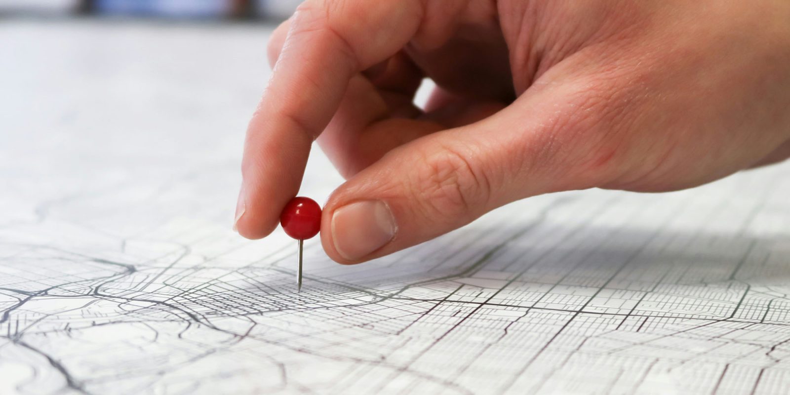 Apple Location Services vulnerability | Hand placing pin on map