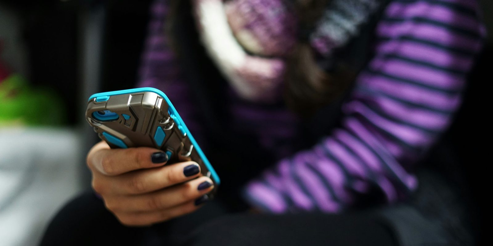 Teen Instagram addiction under investigation | Close-up of teenager using smartphone