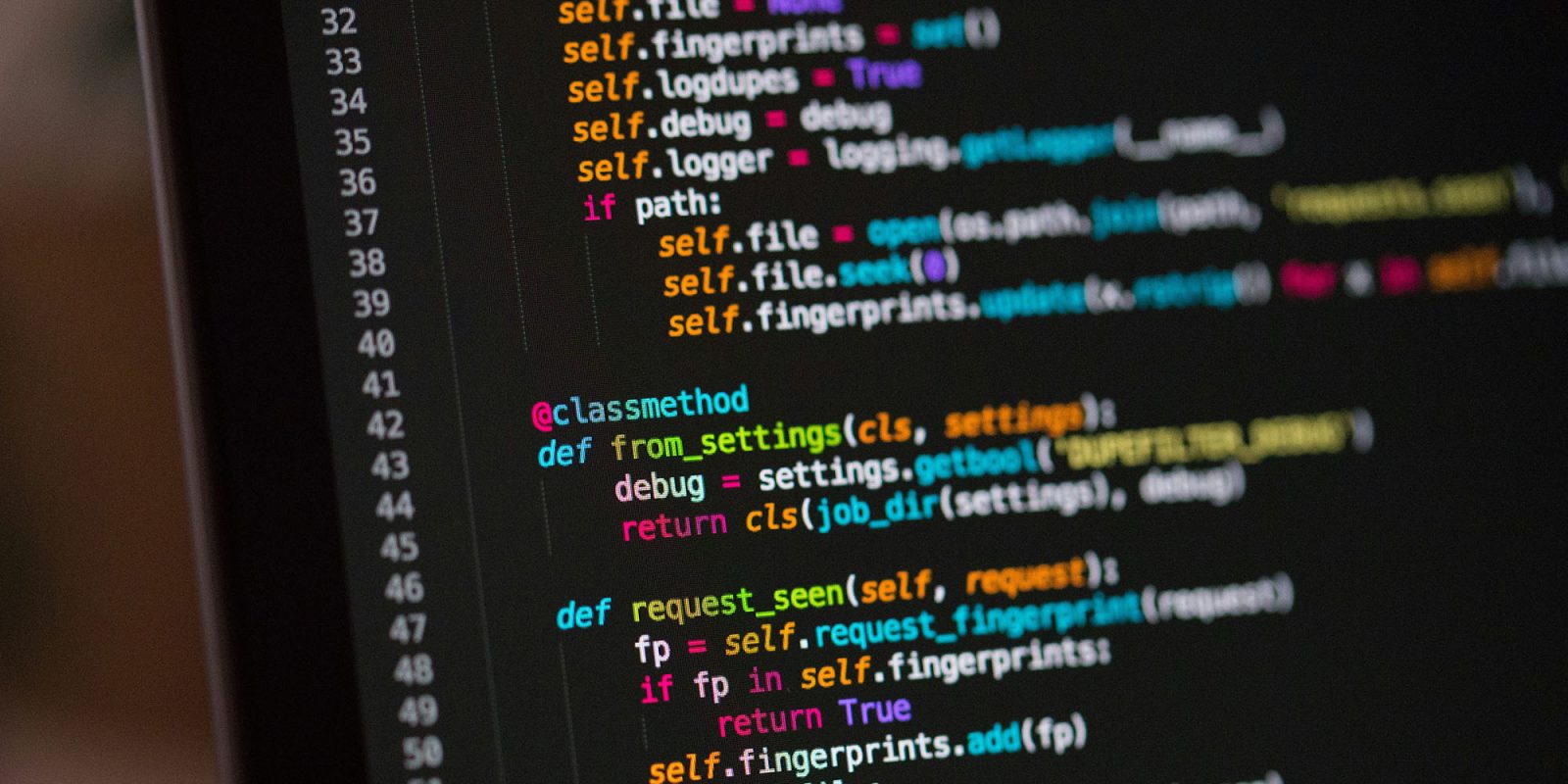 TikTok algorithm could have US-only version | Code on laptop screen