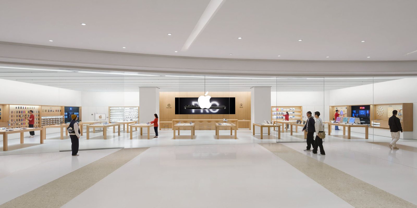 Latest Apple store again has curved frontage with seamless transition to interior | Photo of Apple MixC Hefei
