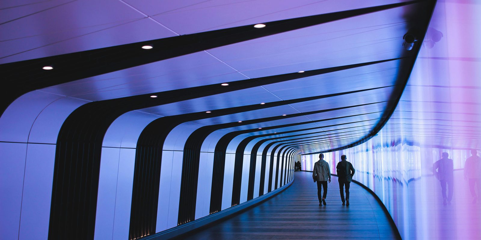 Net neutrality protections again lost as federal court overrules the FCC | Photo shows futuristic-looking pedestrian tunnel