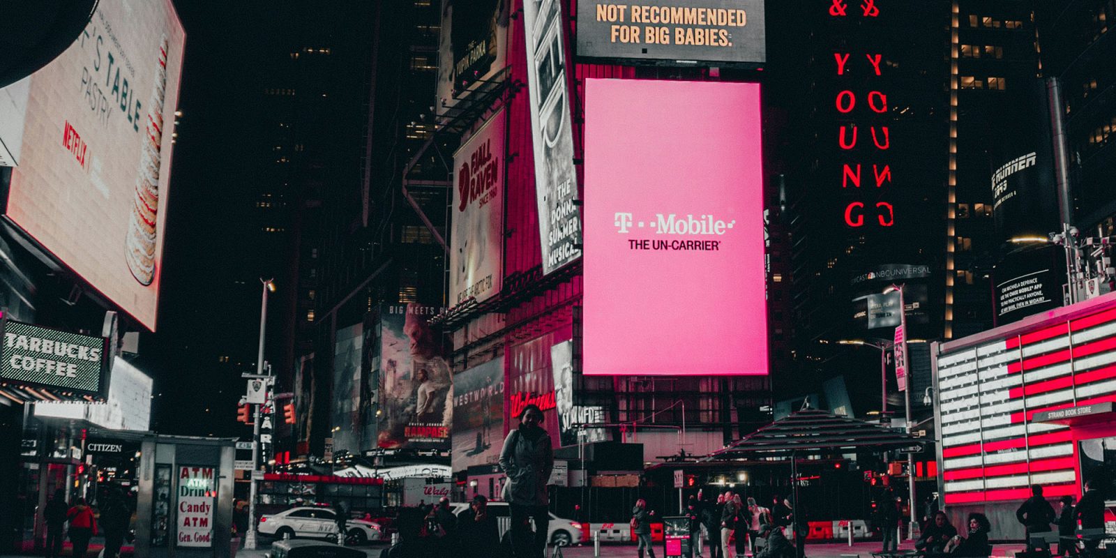 Washington State suing T-Mobile over data breach impacting 79 million people | T-Mobile ad in Times Square