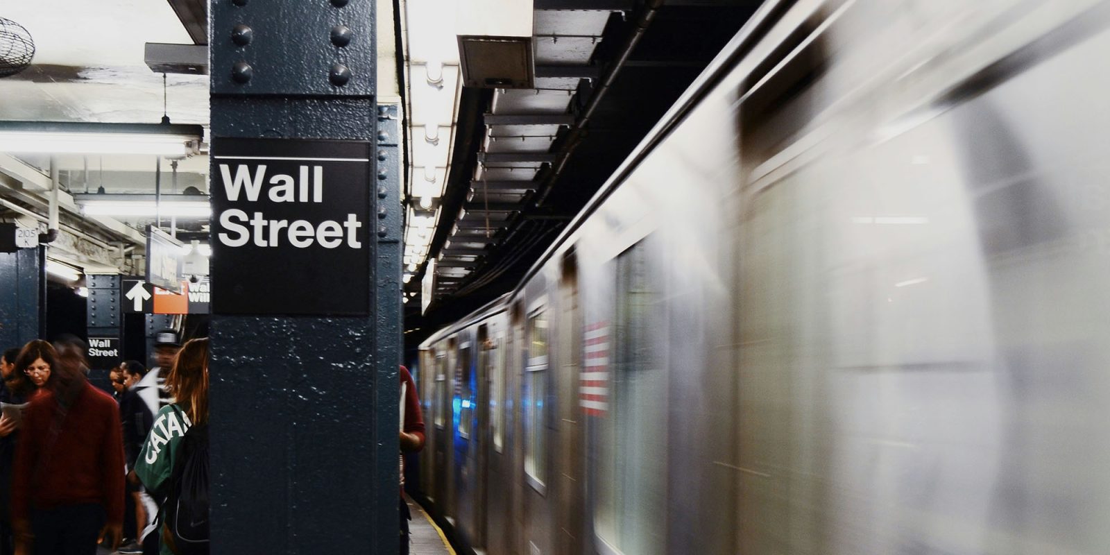 An app for deaf and hard of hearing users provides help for New York MTA riders | Wall Street station shown, with train pulling out