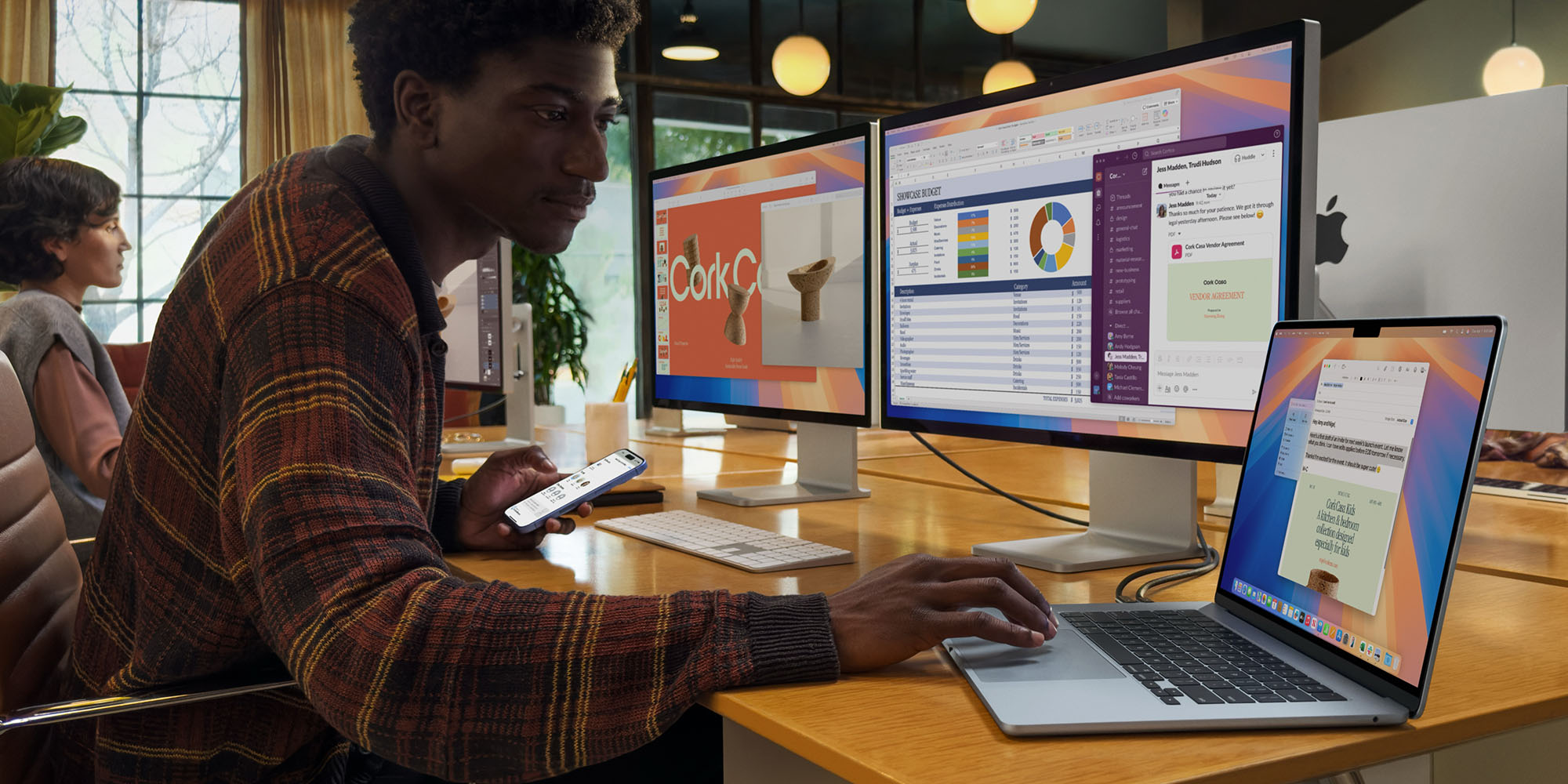 M4 MacBook Air reviews | Apple photo of the machine hooked up to two external monitors