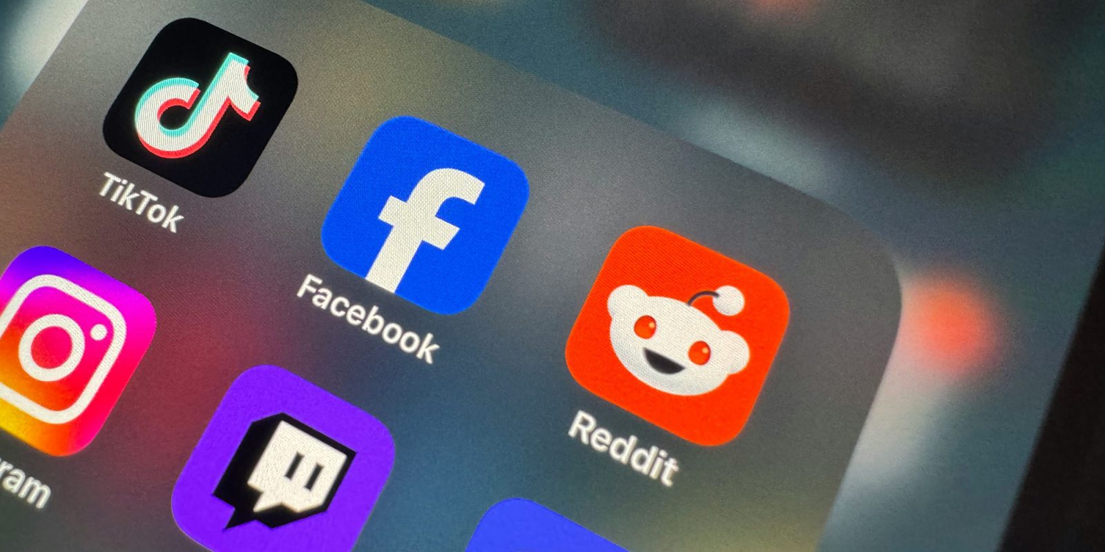 Major investigation launched into child protection measures on TikTok, Reddit, and Imgur | App icons seen on an iPhone