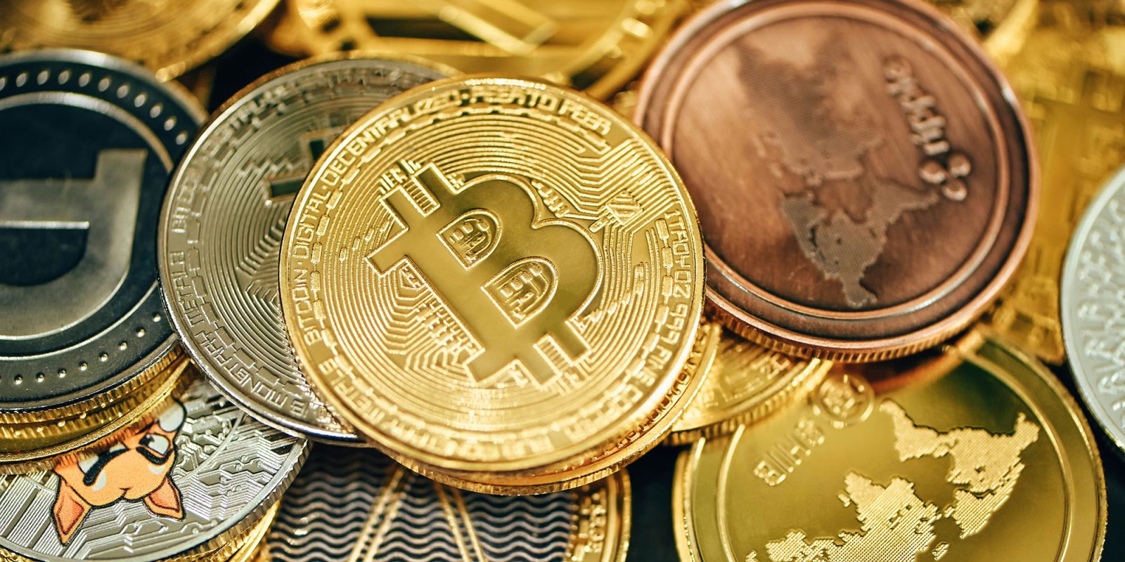 Apple blocks 14 cryptocurrency apps at request of Korean regulator | Stock image of crypto coins