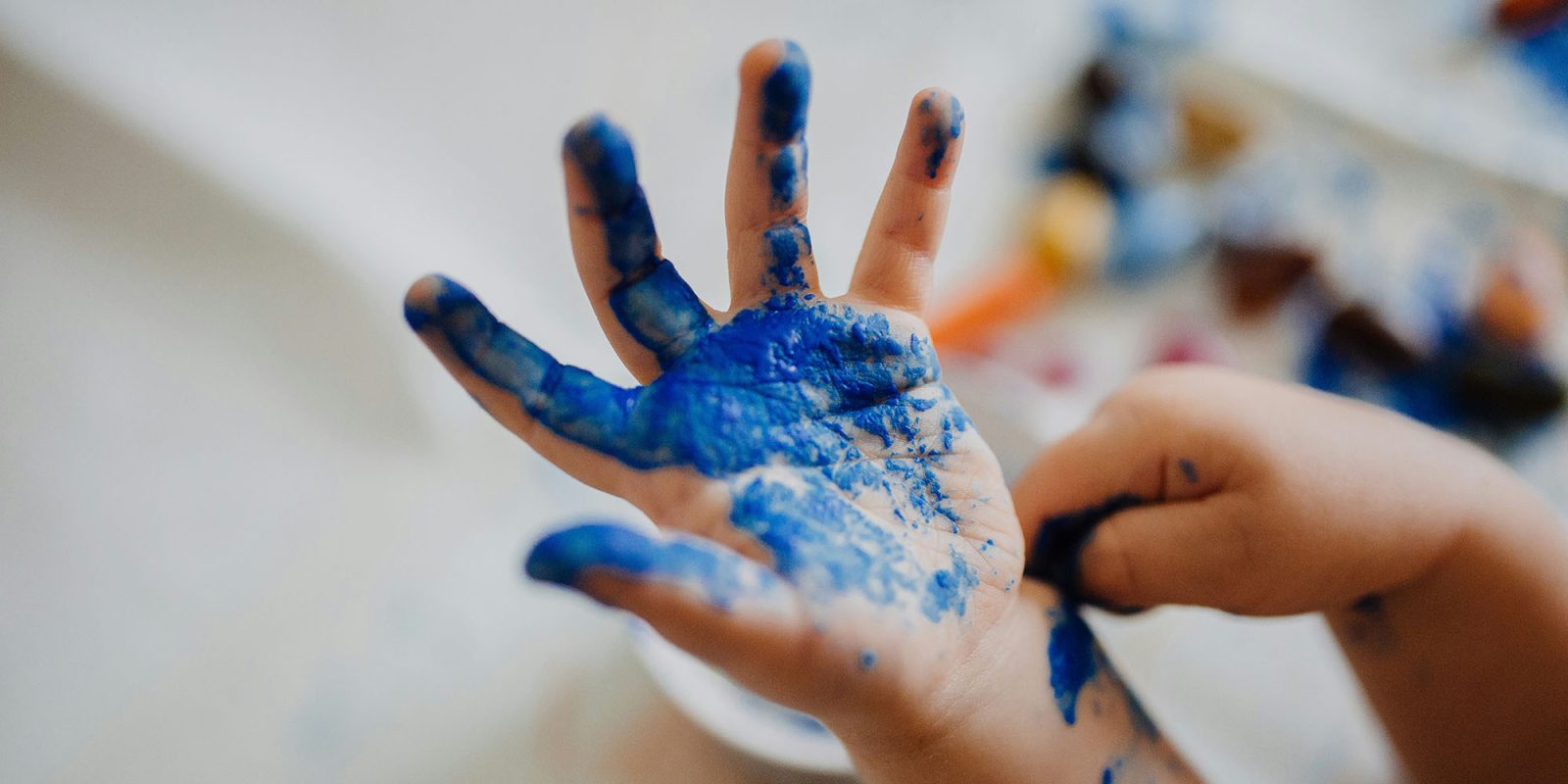 Apple says it maybe can't trust Meta, after incompetent redaction | Child's hand covered in paint