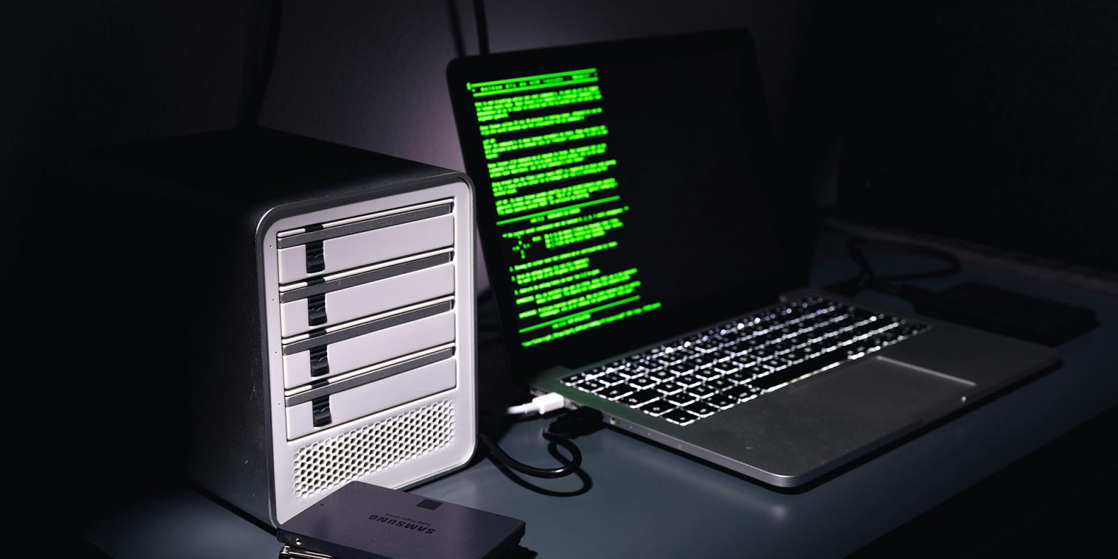 CVE security program used by Apple and others under immediate threat | MacBook connected to a hard drive caddy