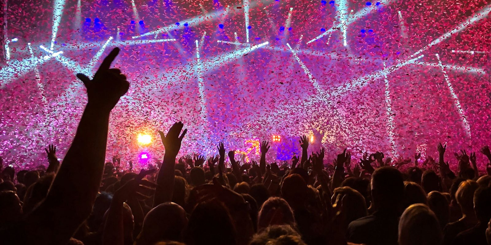 Hidden fees are now illegal for hotel and concert apps | The Killers gig shown