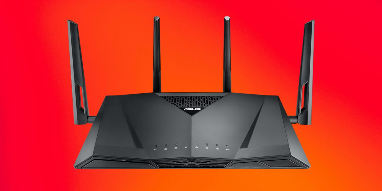 Thousands of ASUS wireless routers compromised by botnet | RT-AC3100 model shown on red background