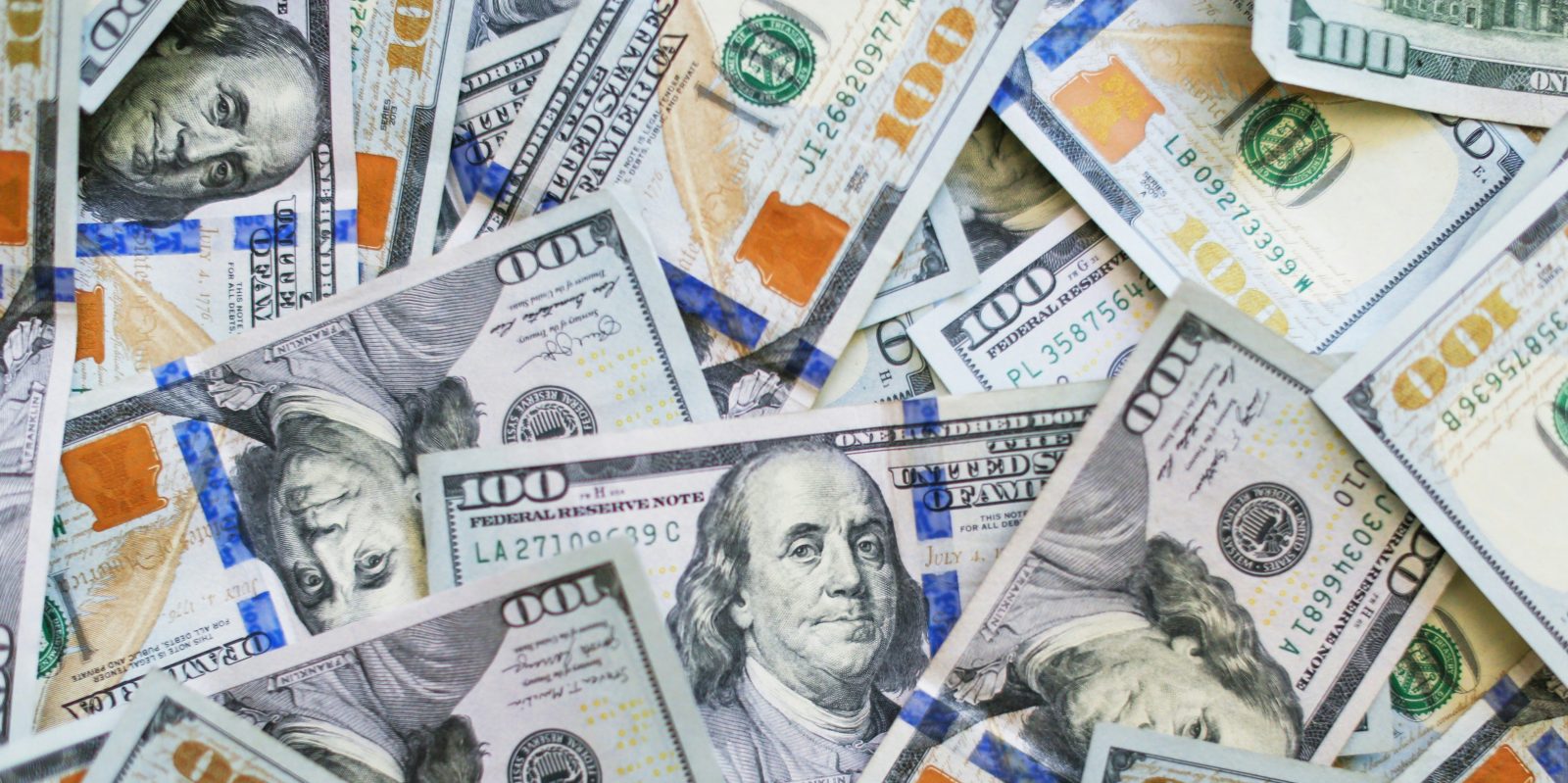 Warren Buffett says Apple made Berkshire more money than he ever did | A mass of $100 bills