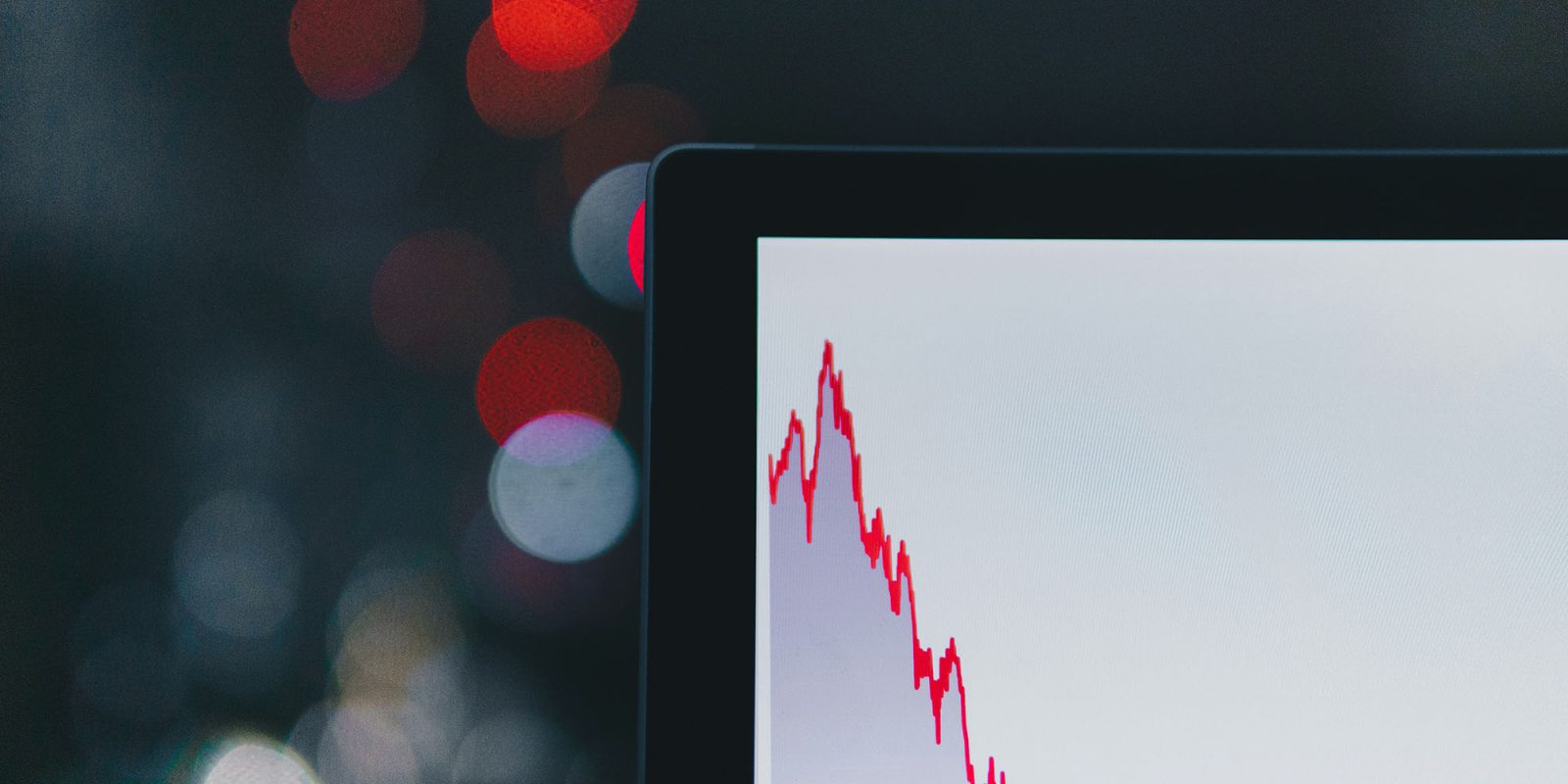 iPhone and other smartphone imports from China hit lowest level since 2011 | Red graph on MacBook showing sharp fall