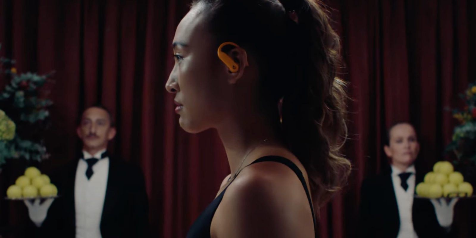 Zheng Qinwen in the new Powerbeats Pro 2 ad.