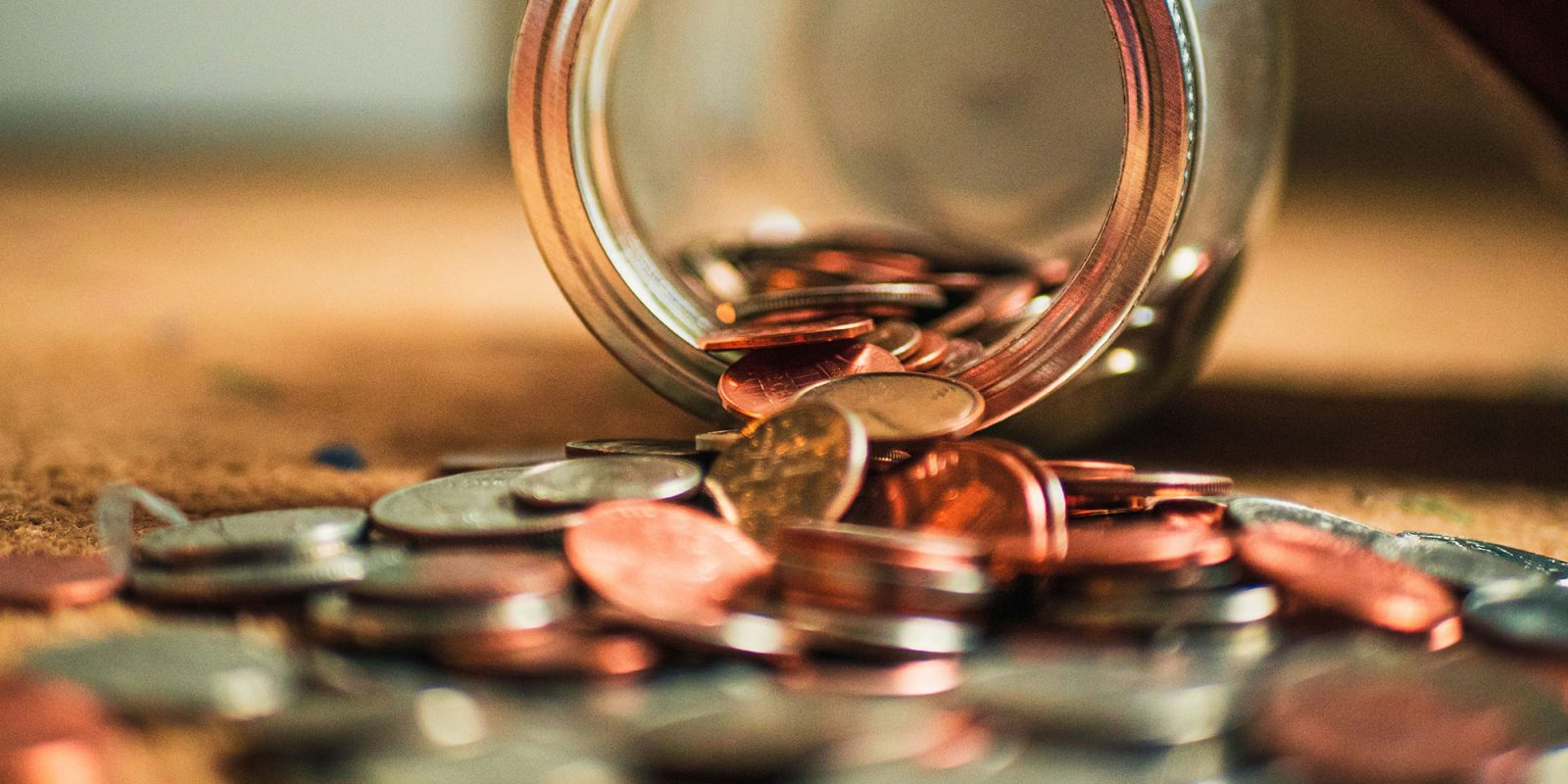 Apple security bounties pay up to $2M, but it only paid $1k for a critical bug | Jar of coins shown