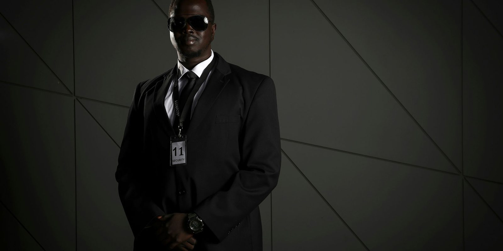 Most of your iCloud data isn’t fully protected – here’s how to change that | Low-key photo of security guard