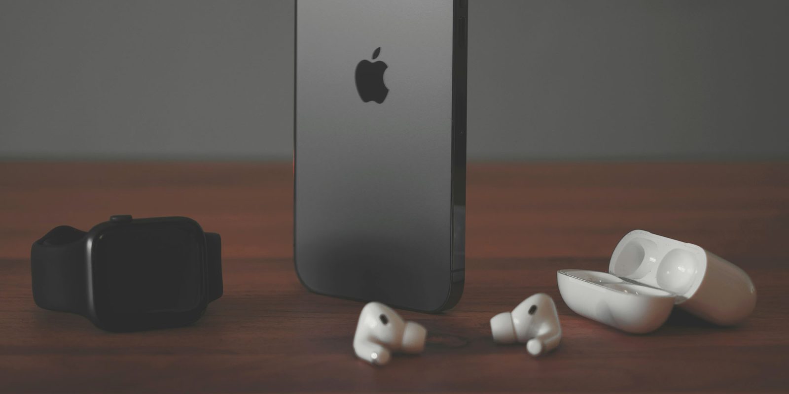 Reverse wireless charging would be great for three reasons – but there may be a problem | AirPods and Apple Watch shown with an iPhone