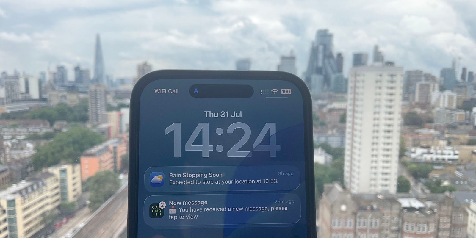 iOS 26 Diary: Much work remains, but I love the new look and the direction | Screengrab against the London skyline