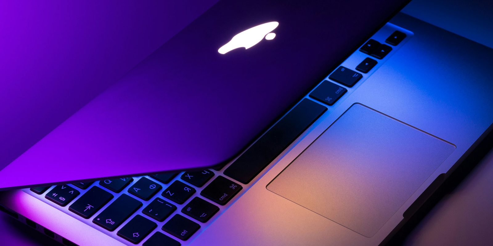 Do you need third-party anti-virus software on a Mac? | Close-up of older MacBook with illuminated Apple logo