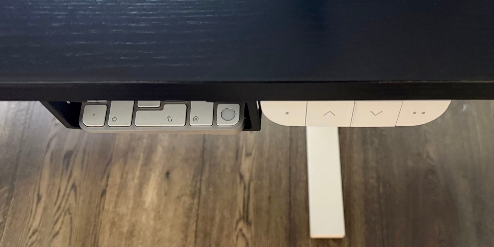 A slightly silly but effective hack for fans of mechanical keyboards and Touch ID | Under-desk brackets holding the keyboard