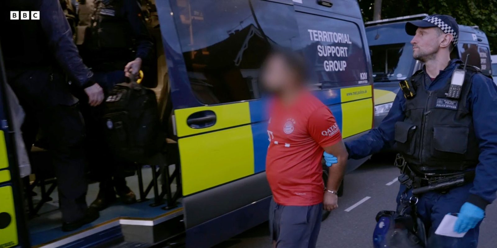 Find My iPhone enabled police to catch gang smuggling 40,000 phones to China | Still image from BBC coverage of a dawn raid