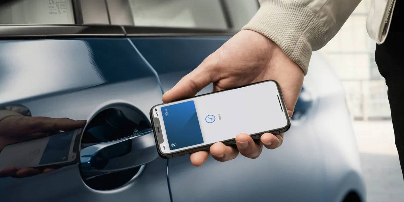 Apple faces three barriers to wider adoption of Car Key | Car Key seen opening a BMW