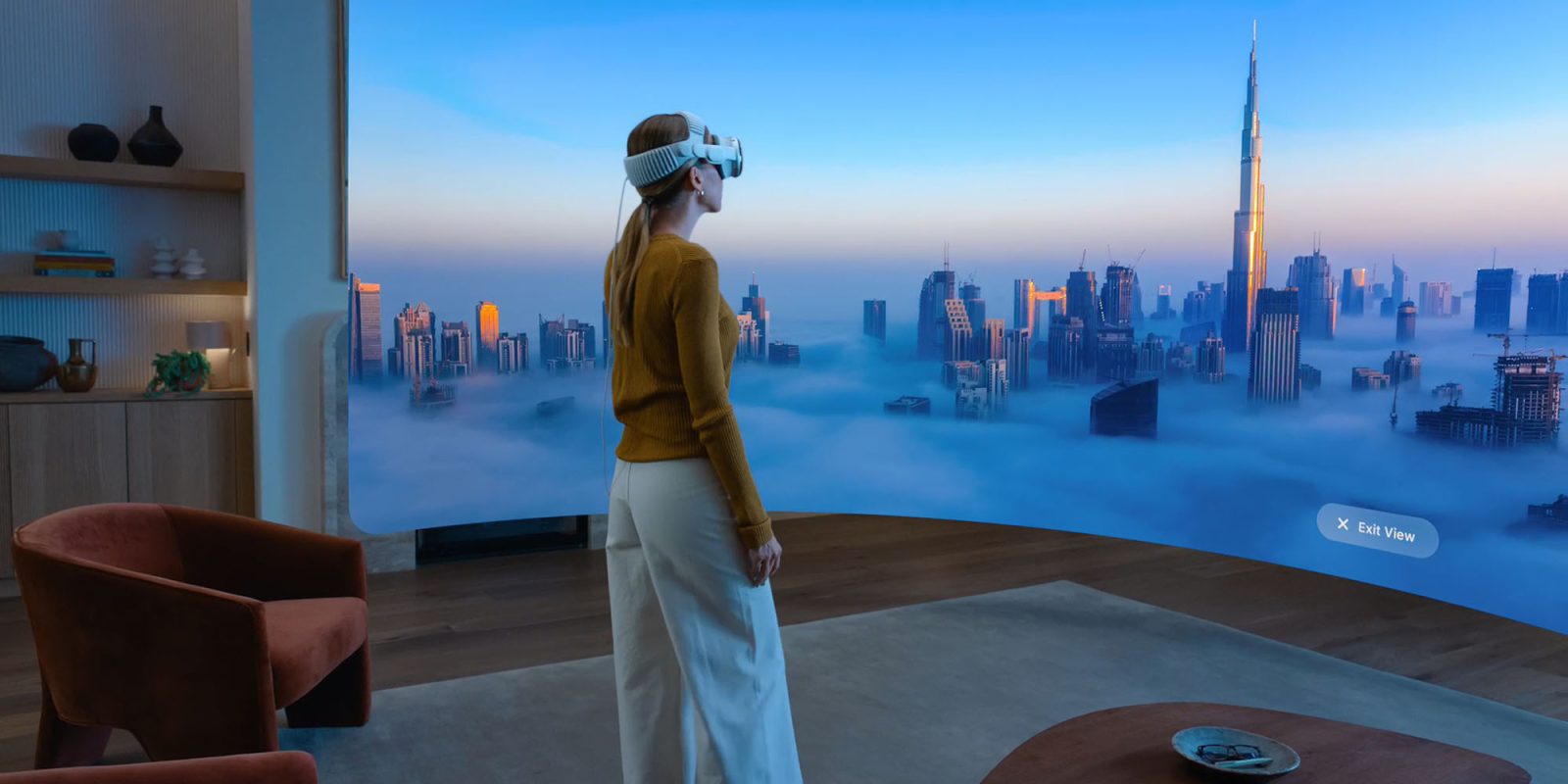 M5 Vision Pro goes on sale in two more countries | Apple promotional photo showing a woman enjoying an immersive city view